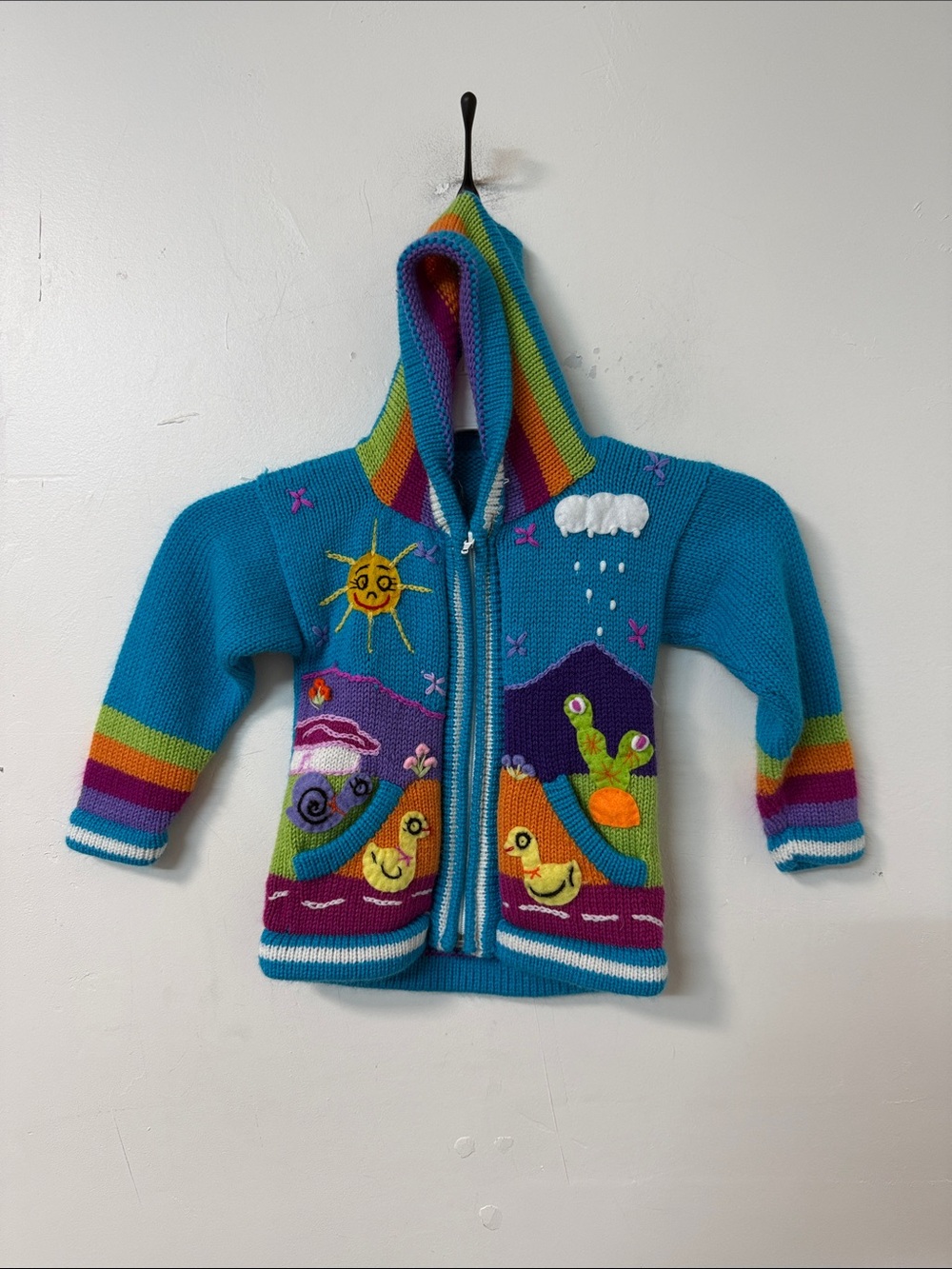 Peruvian Connection Bright Turquoise Hooded Kids Sweater with Rainbow Trim